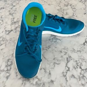Brand new, never worn Nike Free. Men’s size 10, blue